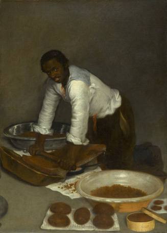 A Man Milling Cacao into Chocolate with a Metate and a Mano
