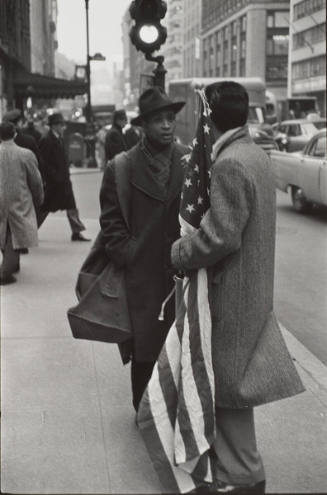 Man Holding Flag on Street
