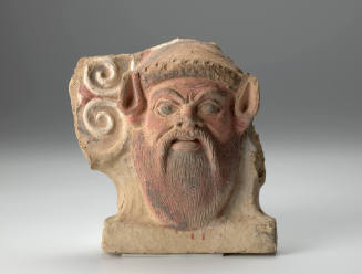 Antefix with head of a satyr