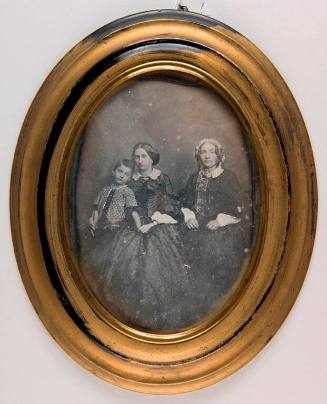 Portrait of two women and a child